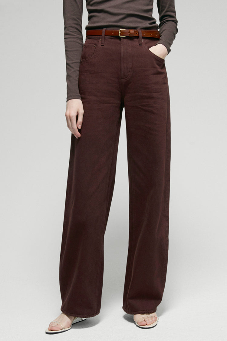 Hey Joanie Slope Curve Jeans HJ039 in classic denim, displayed on a hanger with a close-up of the fabric texture.