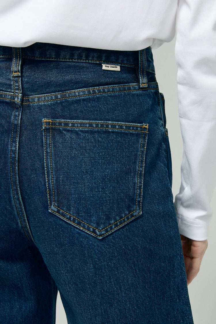 Hey Joanie Slope Curve Jeans HJ039 displayed on a model, showing the fit and style of the denim with a classic blue wash.