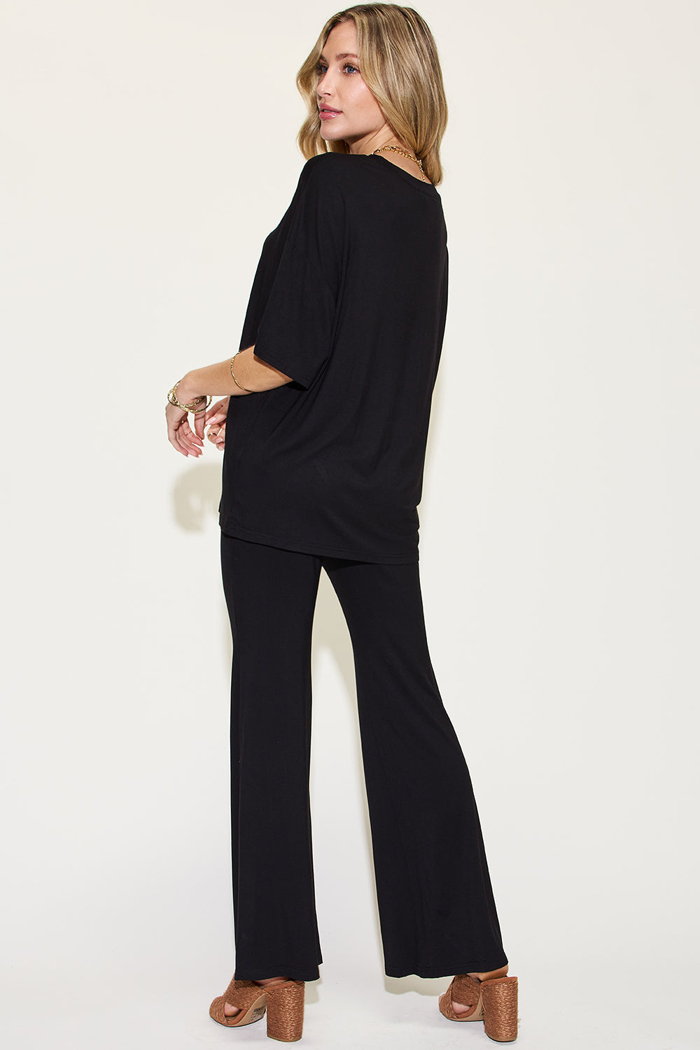 ShopBasicbae bamboo drop shoulder T-shirt and flare pants set, featuring a relaxed fit and natural bamboo fabric.