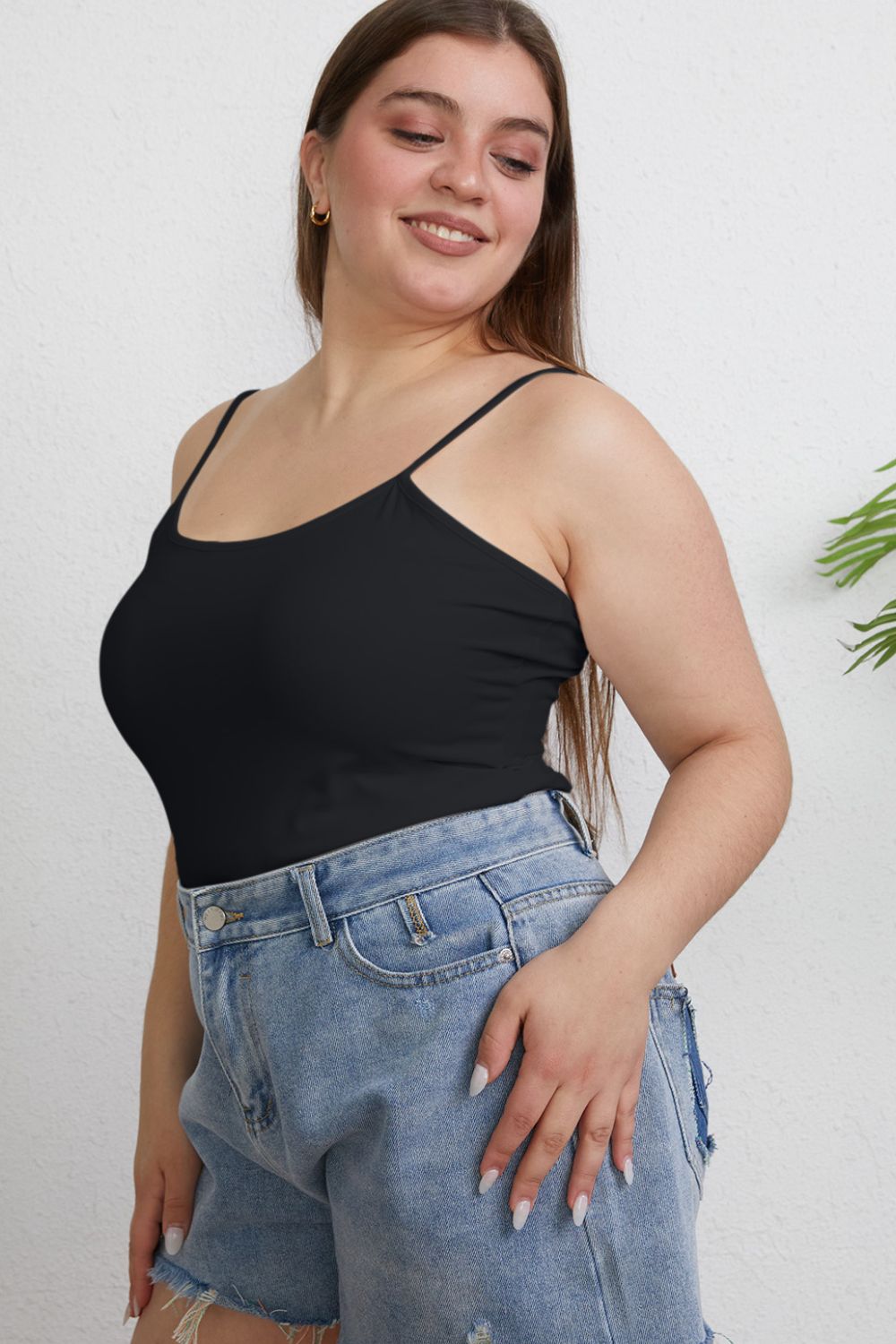 Basic Bae full size round neck slim cami top in soft fabric, shown in a natural pose highlighting its fit and neckline.