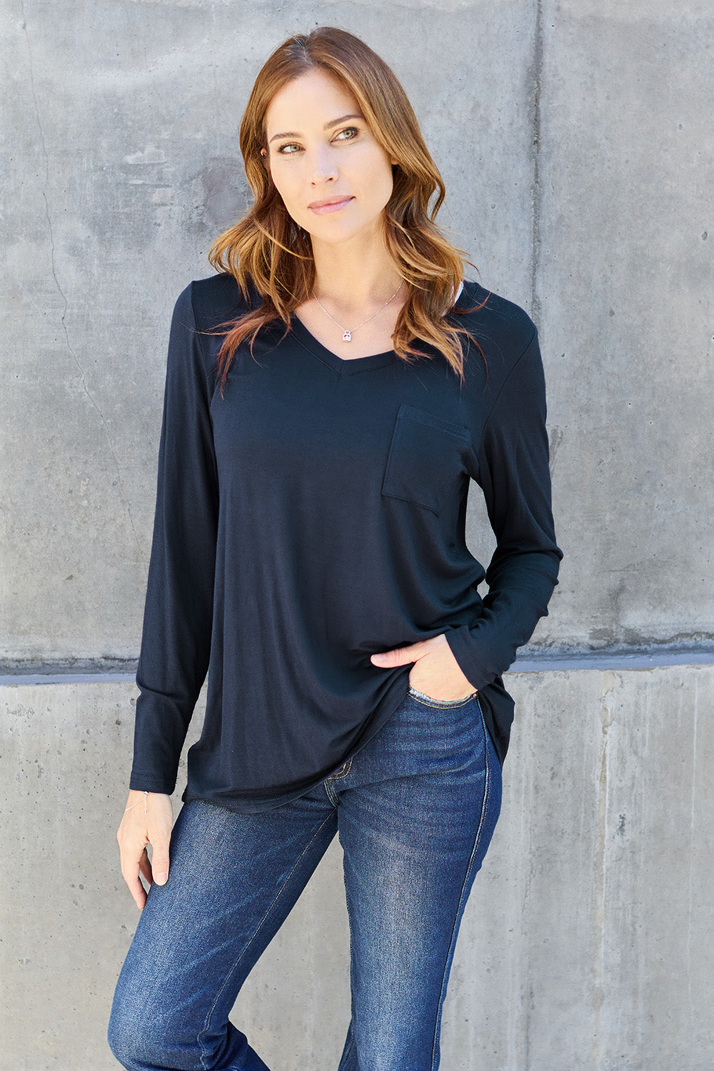 ShopBasicbae Basic Bae full-size V-neck long sleeve top, black casual tops with a relaxed fit and V-neck design.