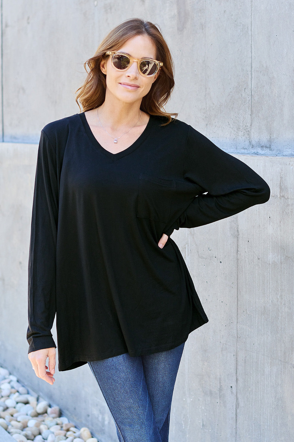 ShopBasicbae Basic Bae full-size V-neck long sleeve top, black, soft fabric, close-up view of the women's casual top.
