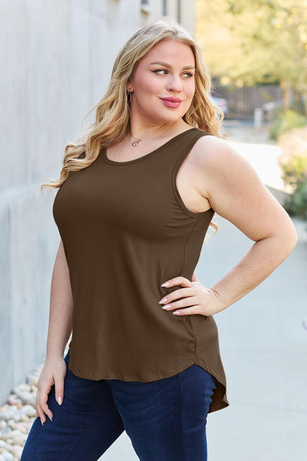 ShopBasicbae basic round neck curved hem tank top, full size, casual sleeveless tops for women, soft fabric and comfortable fit.