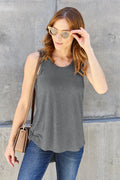 ShopBasicbae Basic Bae full-size round neck curved hem tank top, casual sleeveless top with comfortable fit and stylish design.