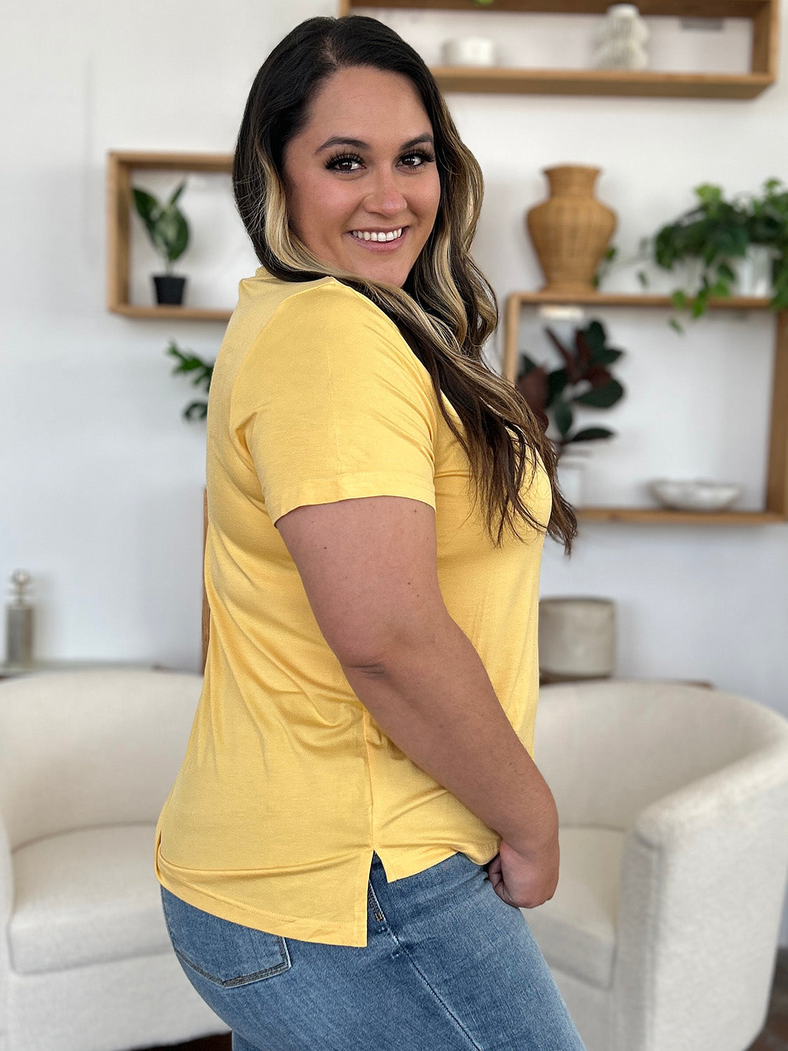 ShopBasicbae bamboo V-neck high-low T-shirt, full size, casual tops featuring a stylish V-neck and comfortable fit.