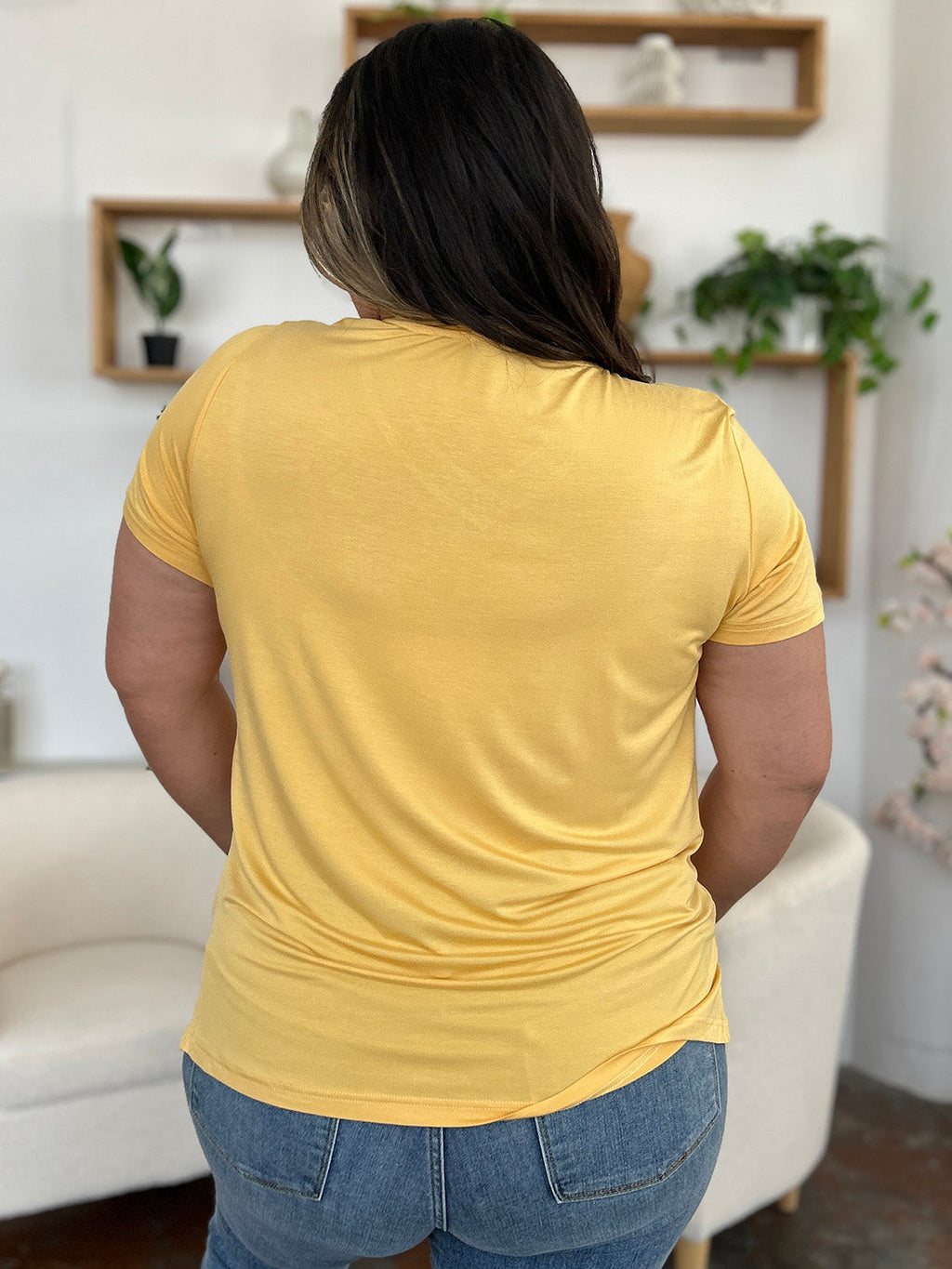 ShopBasicbae bamboo full size v-neck high-low t-shirt, casual tops in a comfortable, stylish design with a relaxed fit.