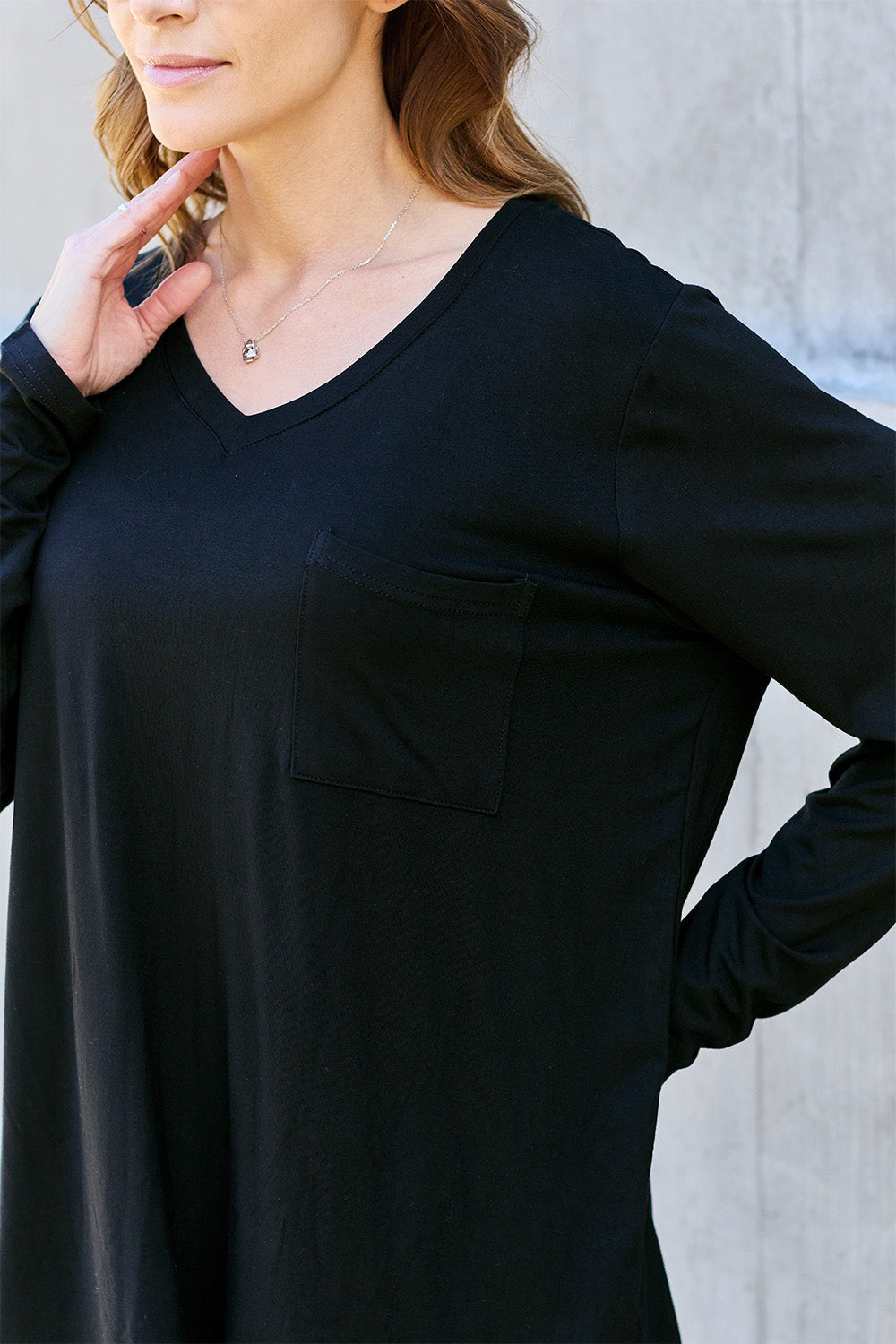 Long sleeve V-neck top from ShopBasicbae's Basic Bae collection, in a versatile and comfortable design.