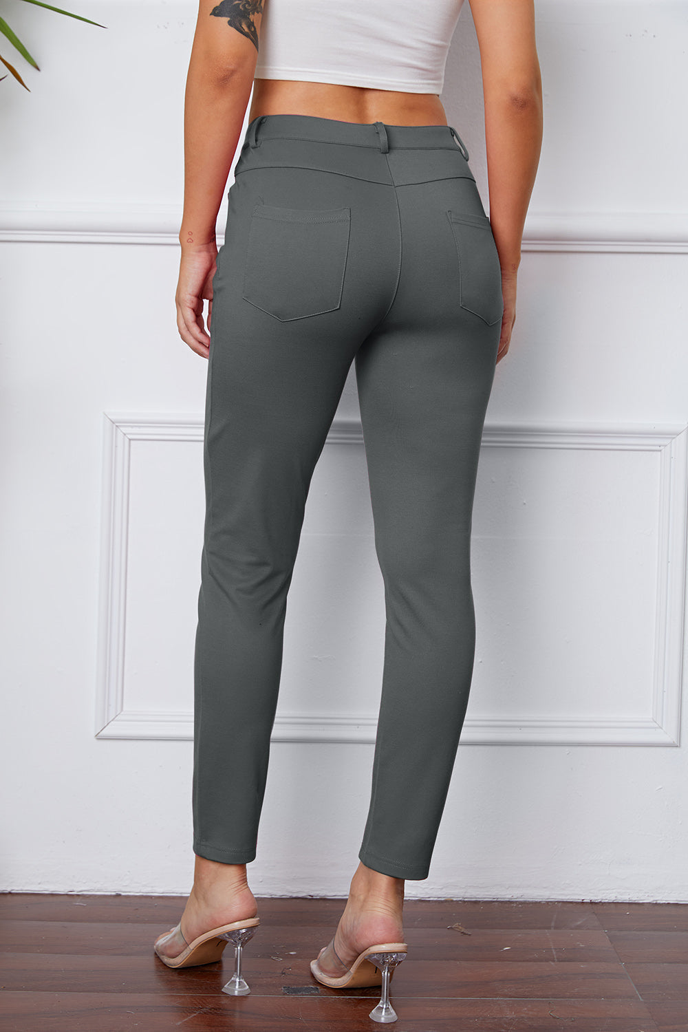 StretchyStitch Pants by Basic Bae, stylish black bottoms with a comfortable, form-fitting design, perfect for casual wear.