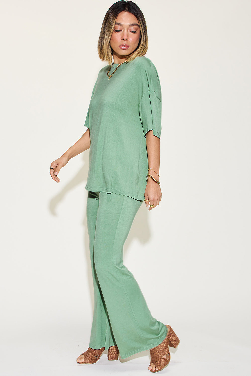 Basic Bae full-size bamboo drop shoulder T-shirt and flare pants set, displaying soft bamboo fabric and relaxed fit.