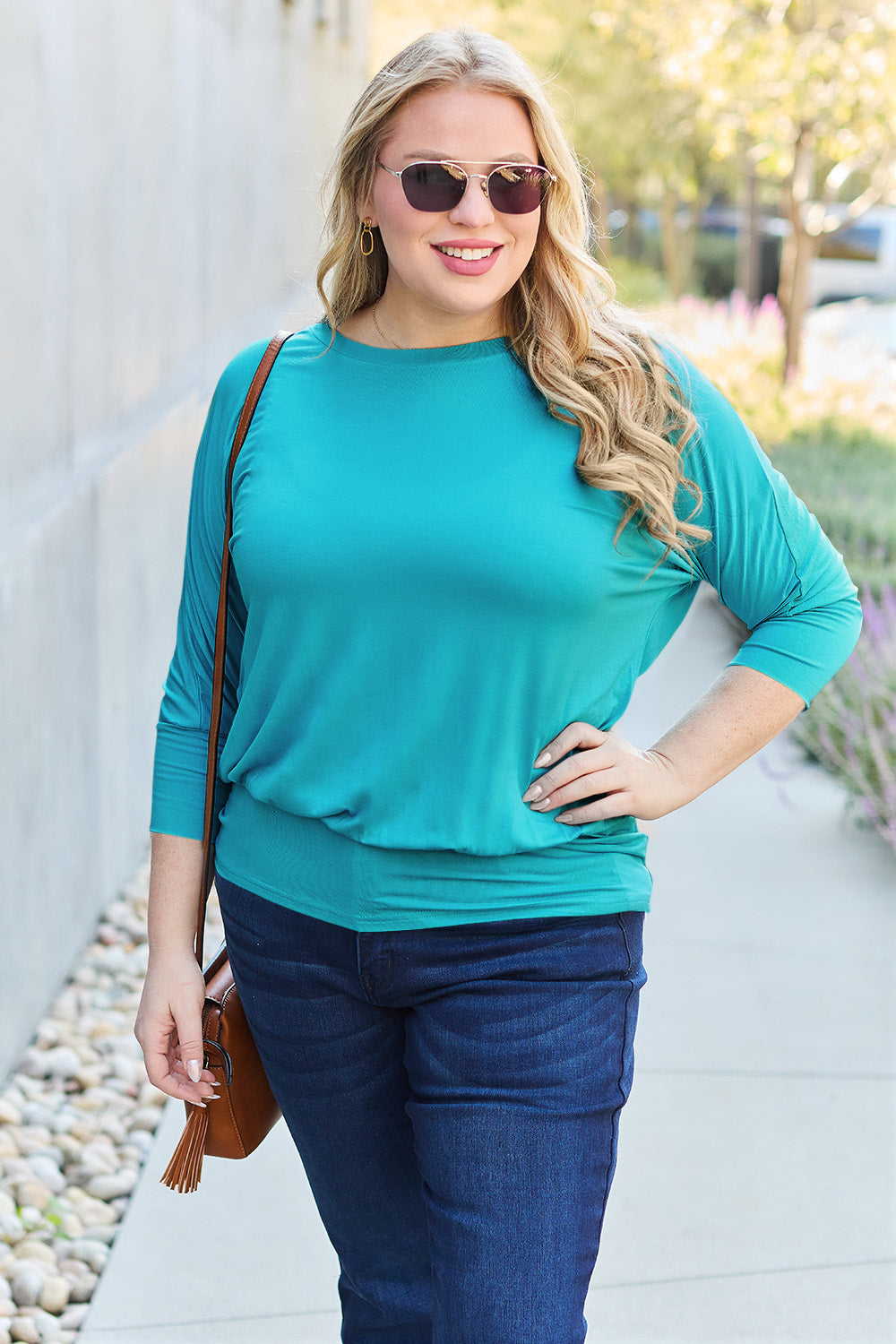 Basic Bae full size round neck batwing sleeve top featuring a relaxed fit and soft fabric for casual wear.