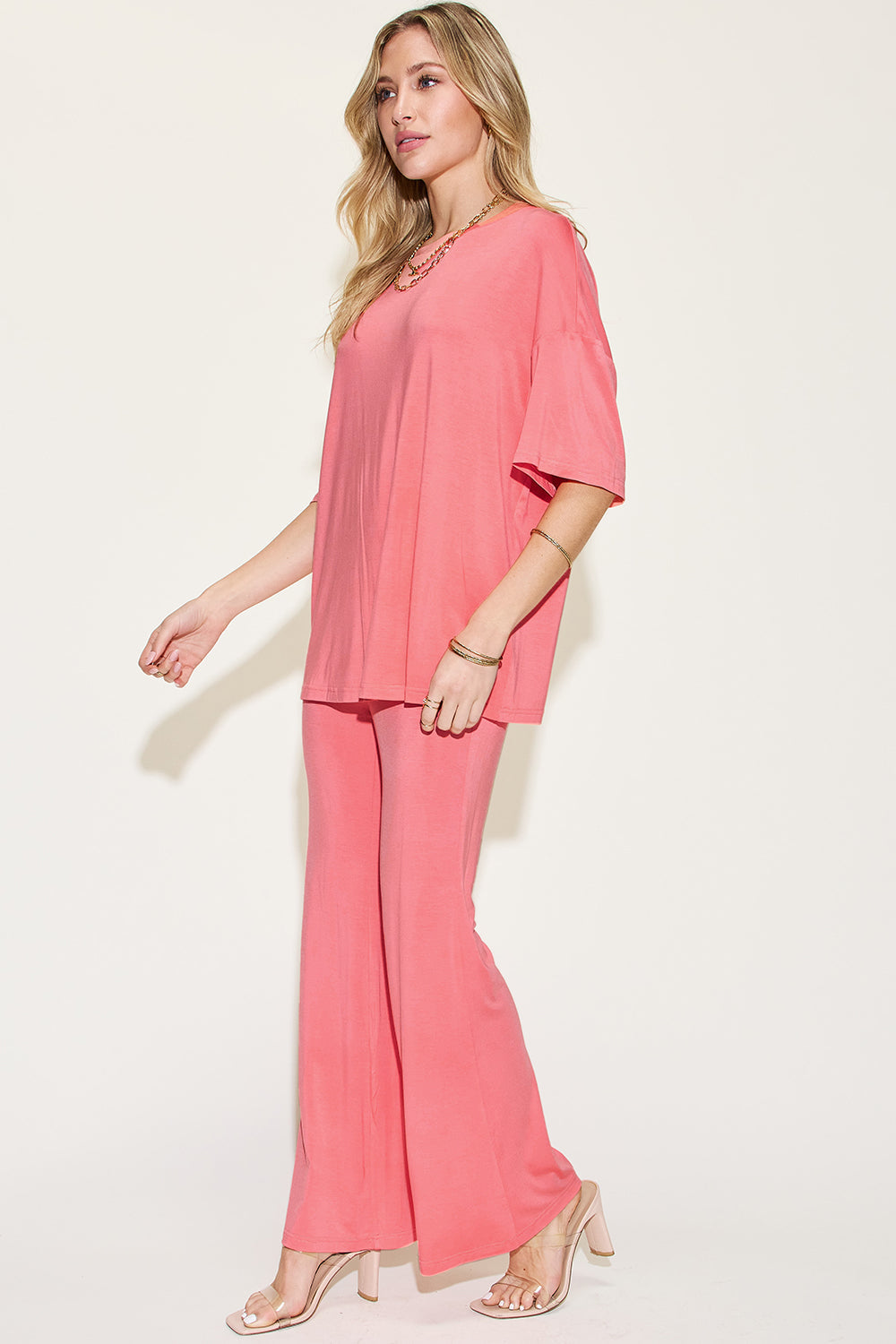 ShopBasicbae bamboo drop shoulder T-shirt and flare pants set, featuring a relaxed fit and natural fabric in a casual style.