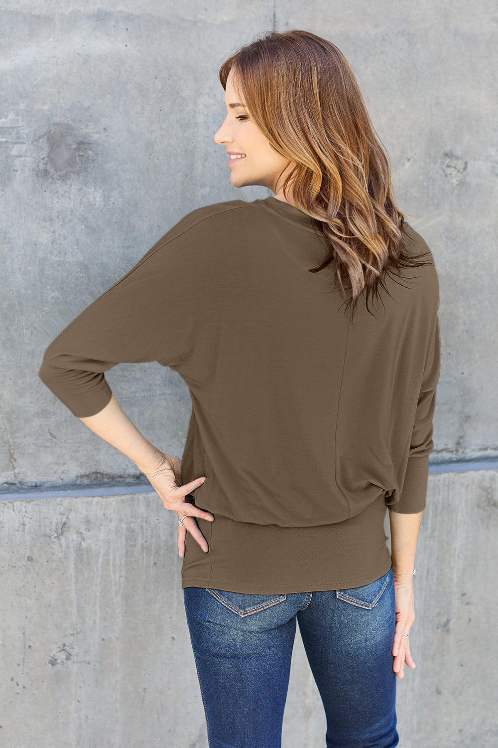 ShopBasicbae Basic Bae full-size round neck batwing sleeve top, featuring a relaxed fit and soft fabric in natural light.