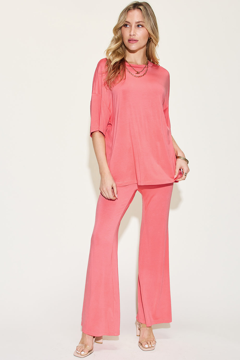 ShopBasicbae bamboo drop shoulder t-shirt and flare pants set, featuring relaxed fit and natural fabric in a casual, stylish design.