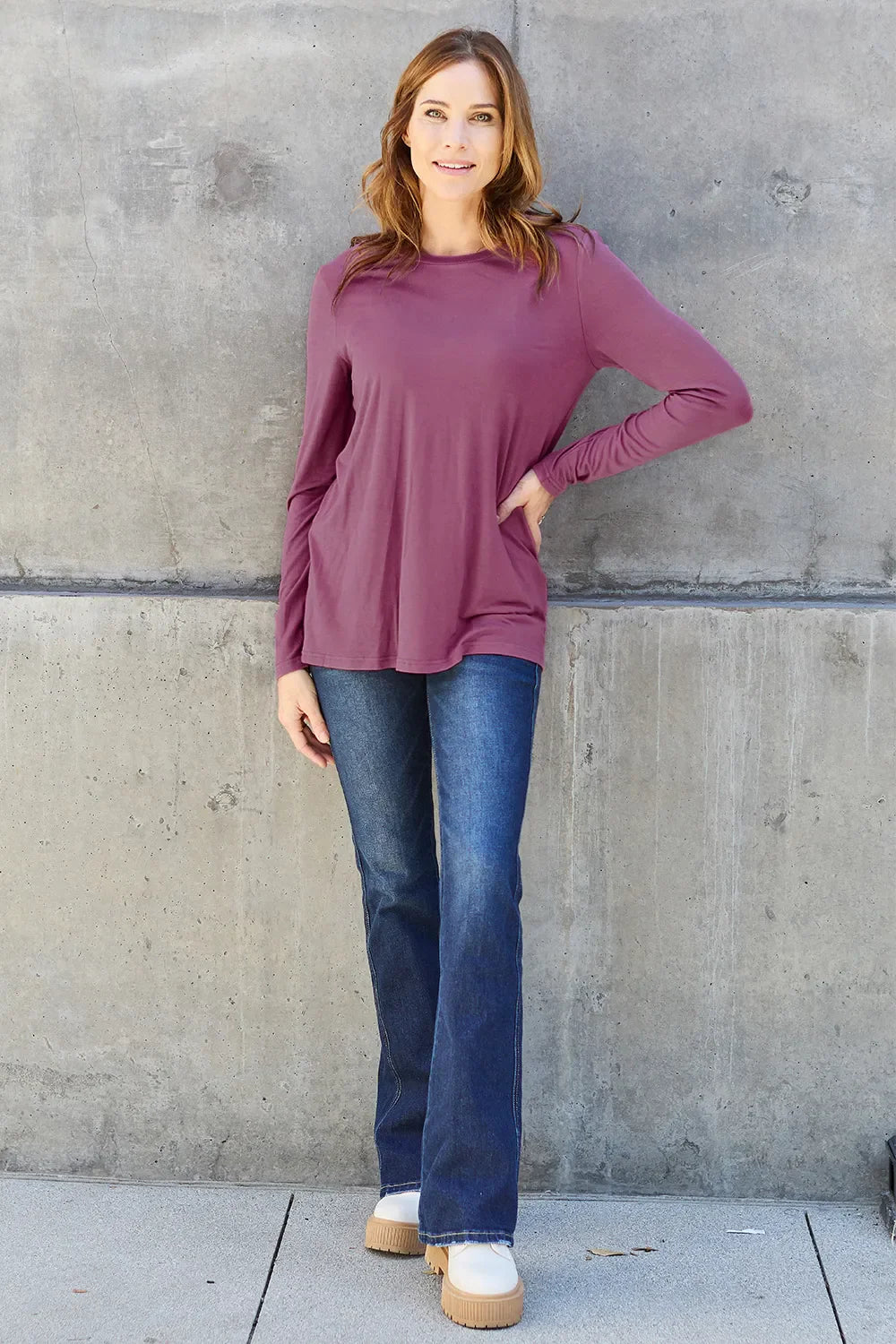 Women's round neck long sleeve top by ShopBasicbae, shown in a comfortable fit with soft fabric and classic design.
