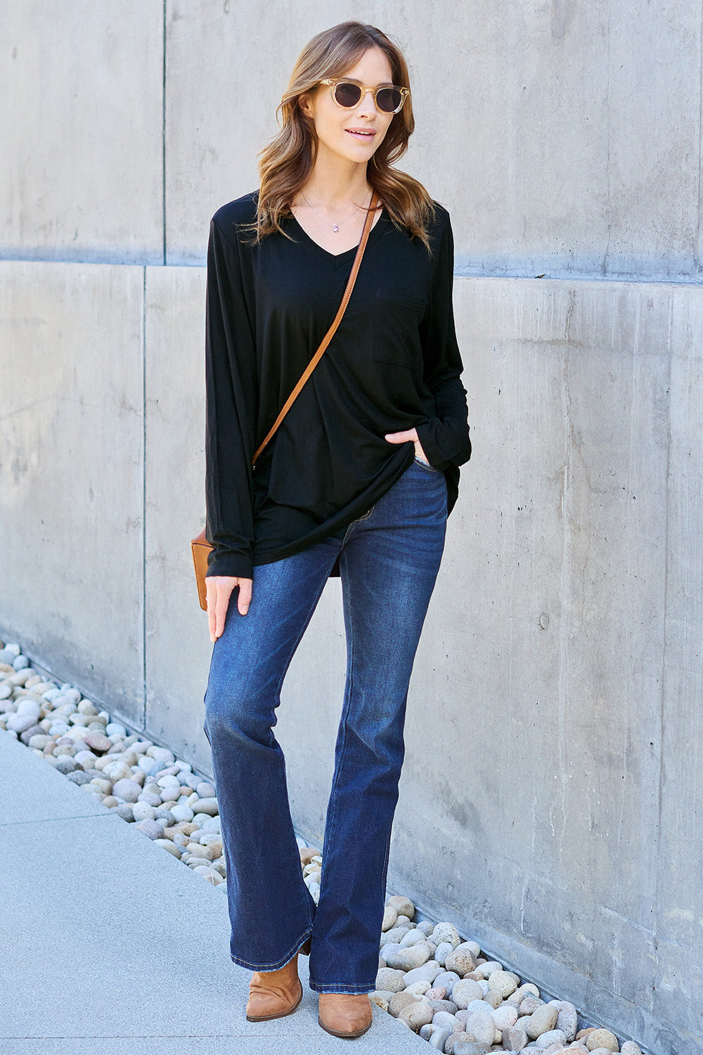 ShopBasicbae Basic Bae V-Neck Long Sleeve Top in neutral fabric, showcasing a fitted long sleeve design with a V-neck neckline.