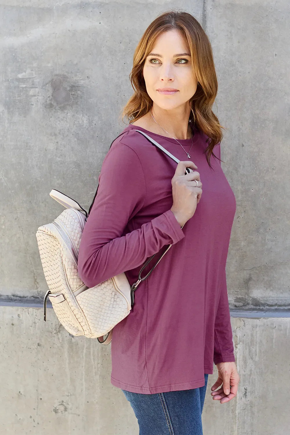 Women's round neck long sleeve top by ShopBasicbae, featuring a fitted design and soft fabric in a versatile style.