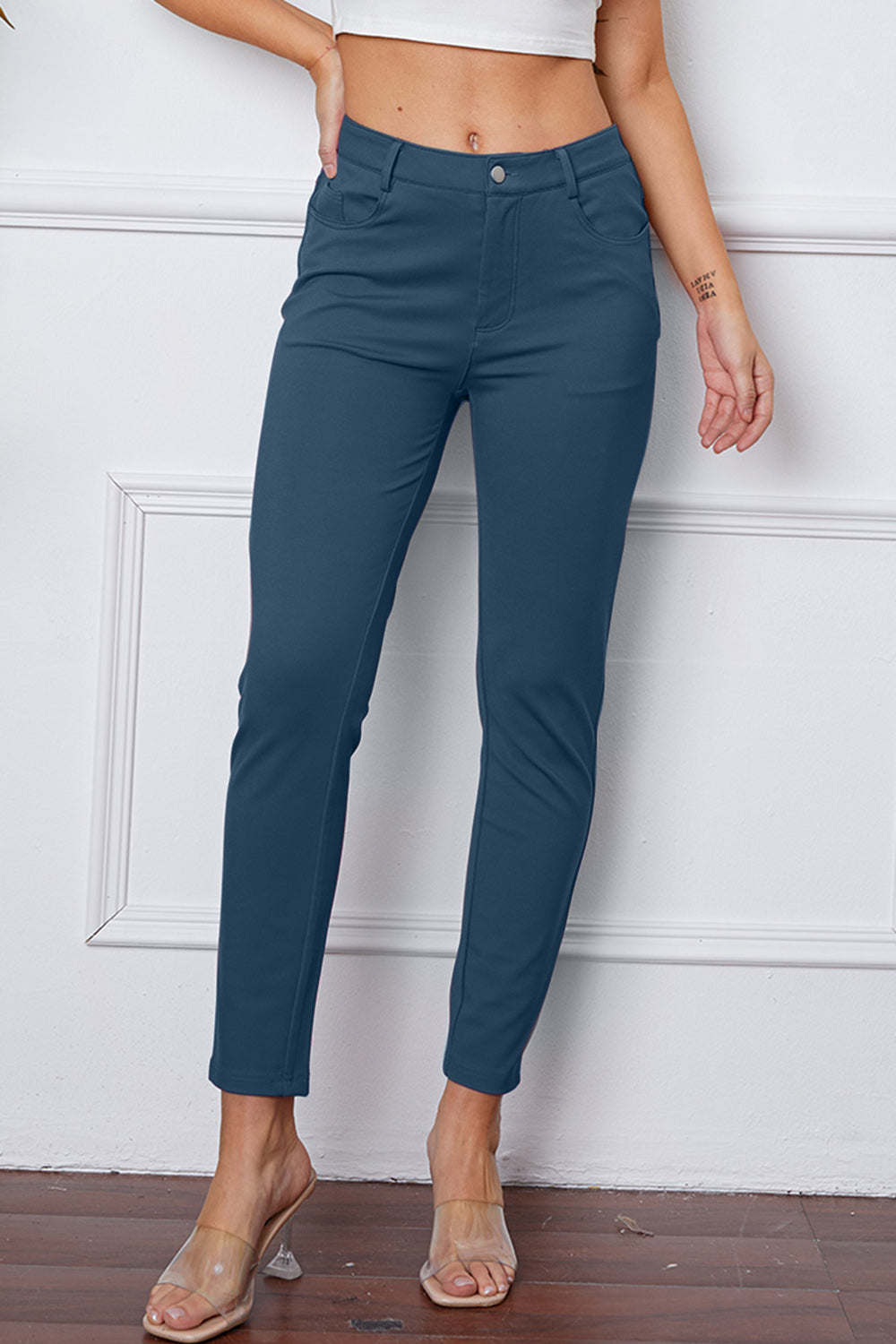 StretchyStitch Pants by Basic Bae, stylish black bottoms with a comfortable stretchy fit and detailed stitching, shown on a model.