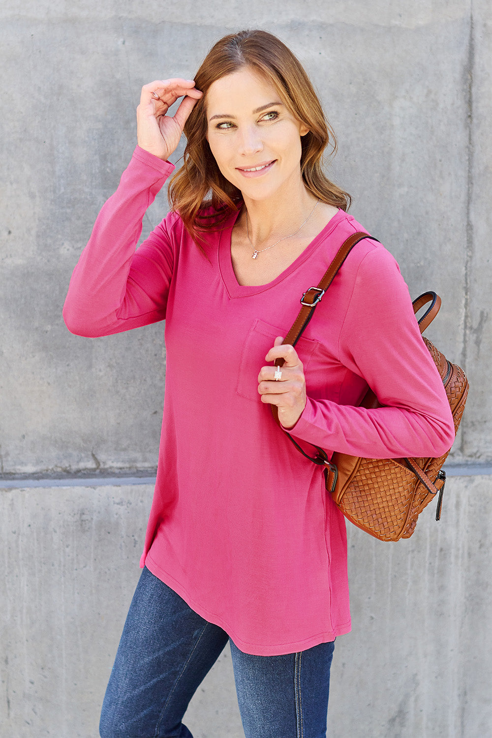 ShopBasicbae Basic Bae full-size V-neck long sleeve top, shown in a neutral color with a relaxed fit and soft fabric.