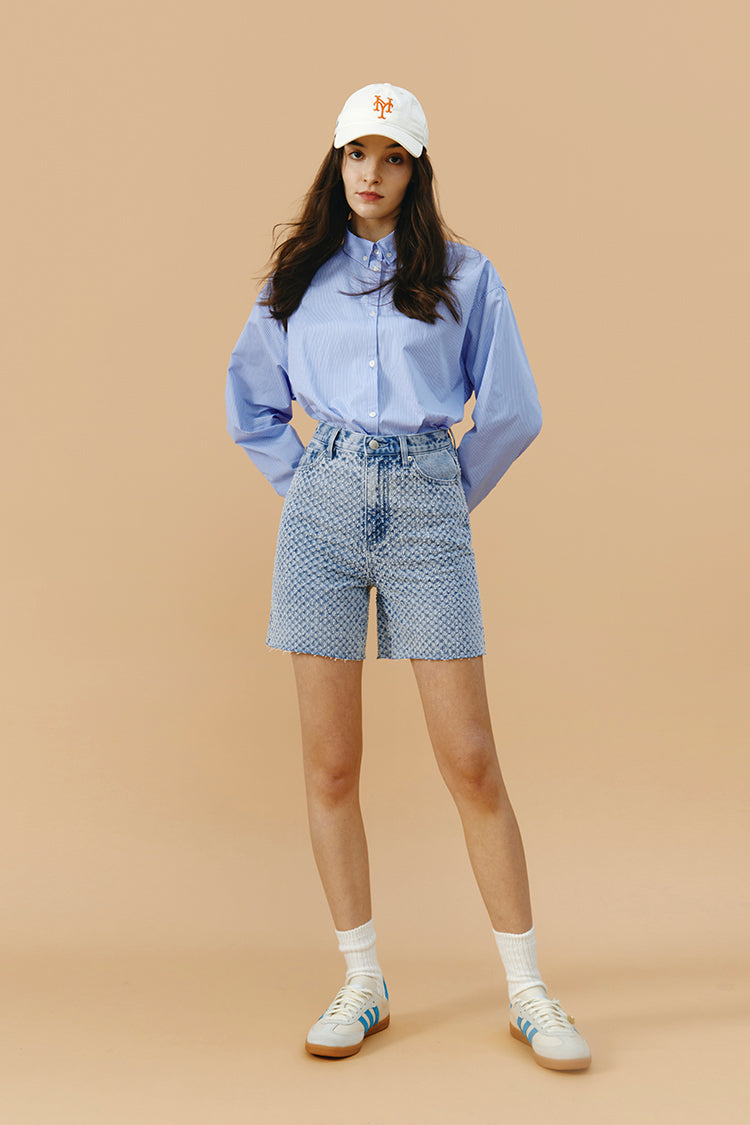 Hey Joanie Venice Tweed High Rise Shorts in beige, showing the textured fabric, high waist, and tailored fit.