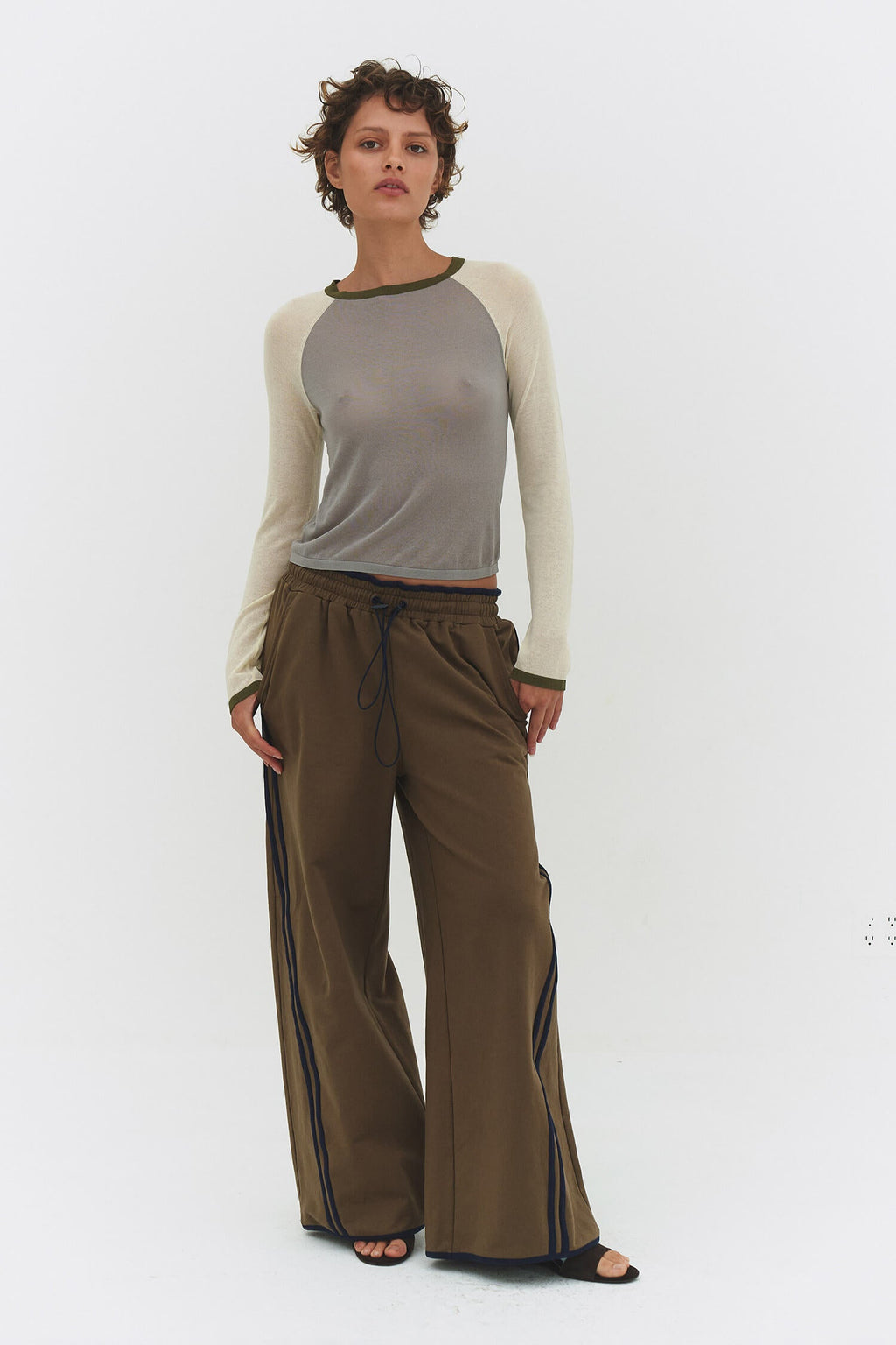 Findmenowthelabel Miraine raglan top in Matcha Mel featuring vintage khaki and dark olive color blocks and a relaxed fit.