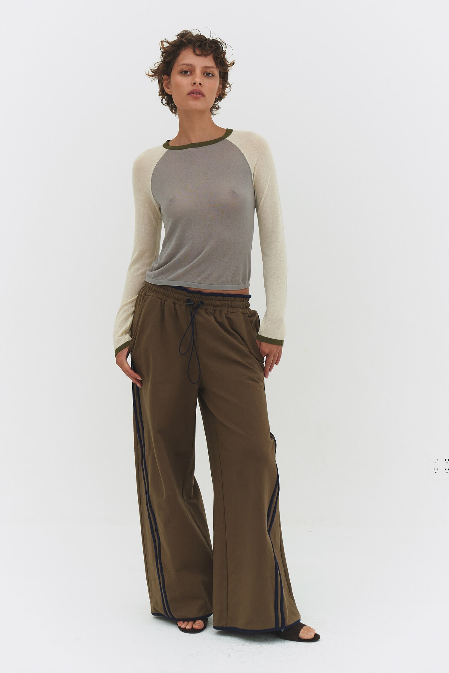 Findmenowthelabel Miraine raglan top in Matcha Mel featuring vintage khaki and dark olive color blocks and a relaxed fit.