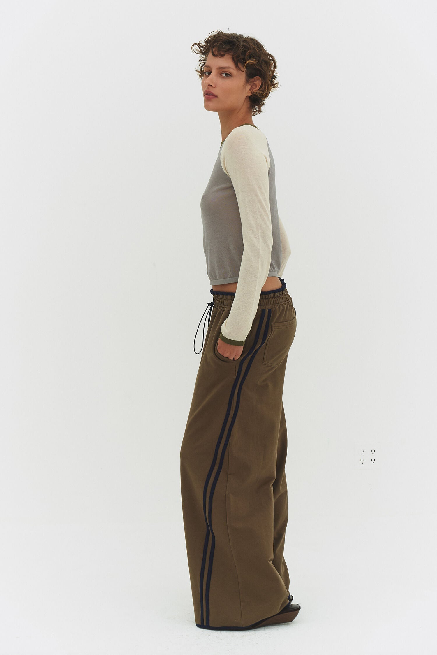 Findmewthelabel Mirinae raglan top in matcha mel with vintage khaki and dark olive colors, featuring a comfortable, casual fit.