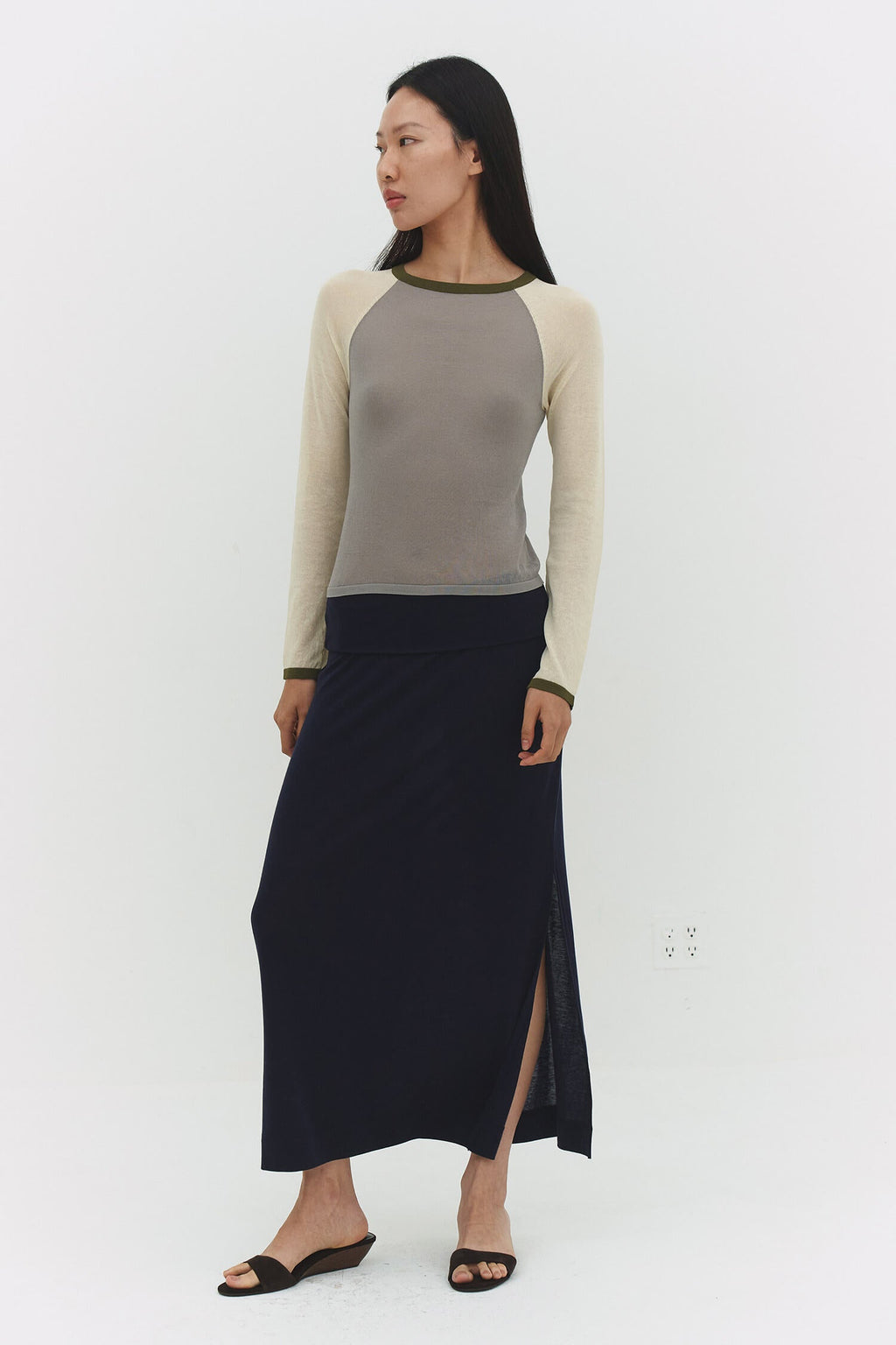 Findmenowthelabel Mirinae raglan top in Matcha Mel featuring vintage khaki and dark olive color blocks with long sleeves.