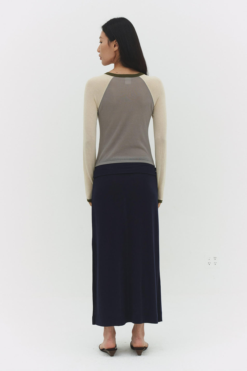 Findmenowthelabel Miraine Raglan Top in Matcha Mel featuring vintage khaki and dark olive color blocks, casual and stylish.