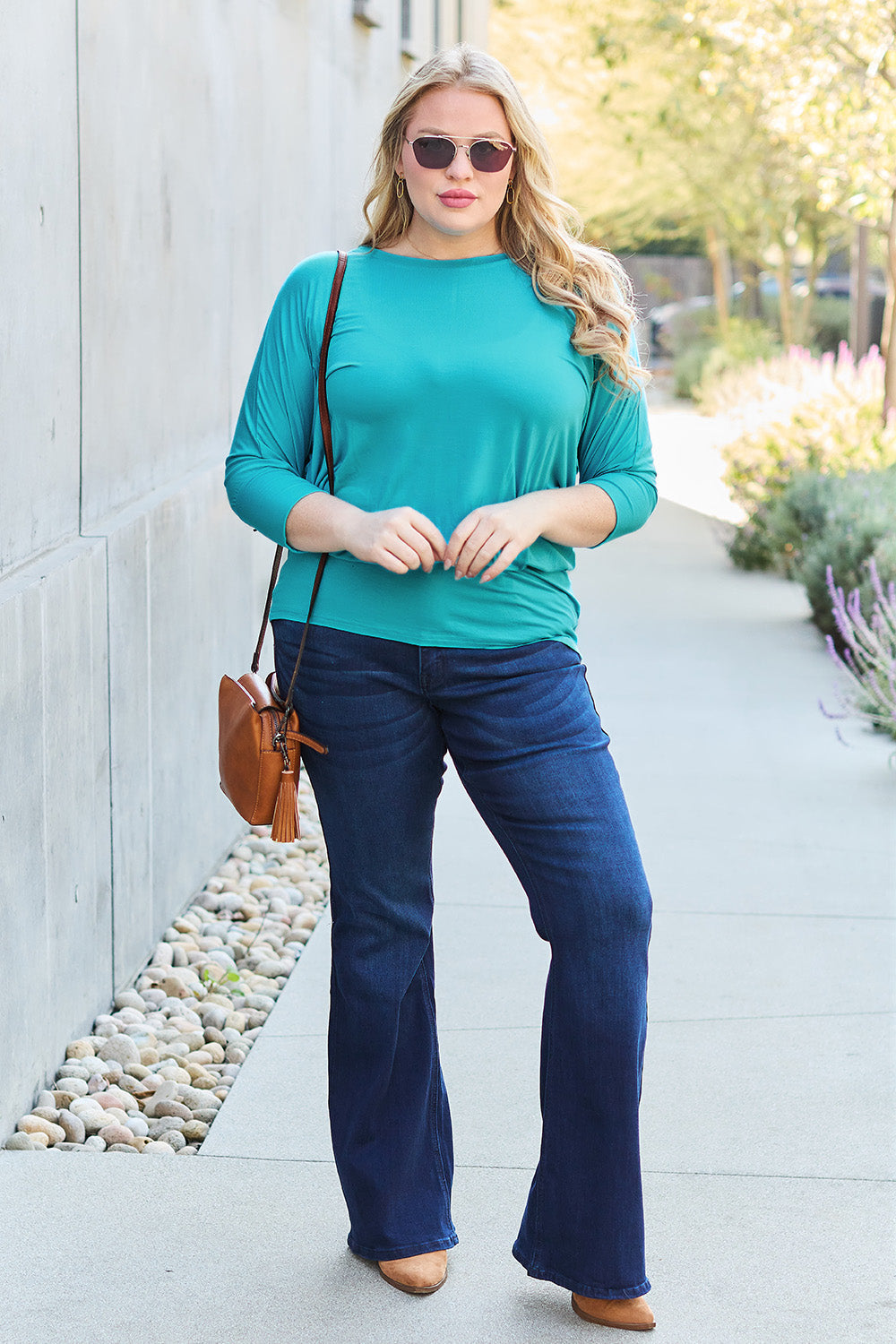 ShopBasicbae basic Bae full-size round neck batwing sleeve top, casual and versatile women's top in a natural pose.