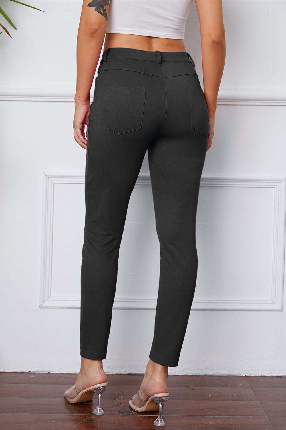 StretchyStitch pants by Basic Bae, stylish black bottoms with a comfortable fit, featuring a smooth, stretchy fabric for everyday wear.