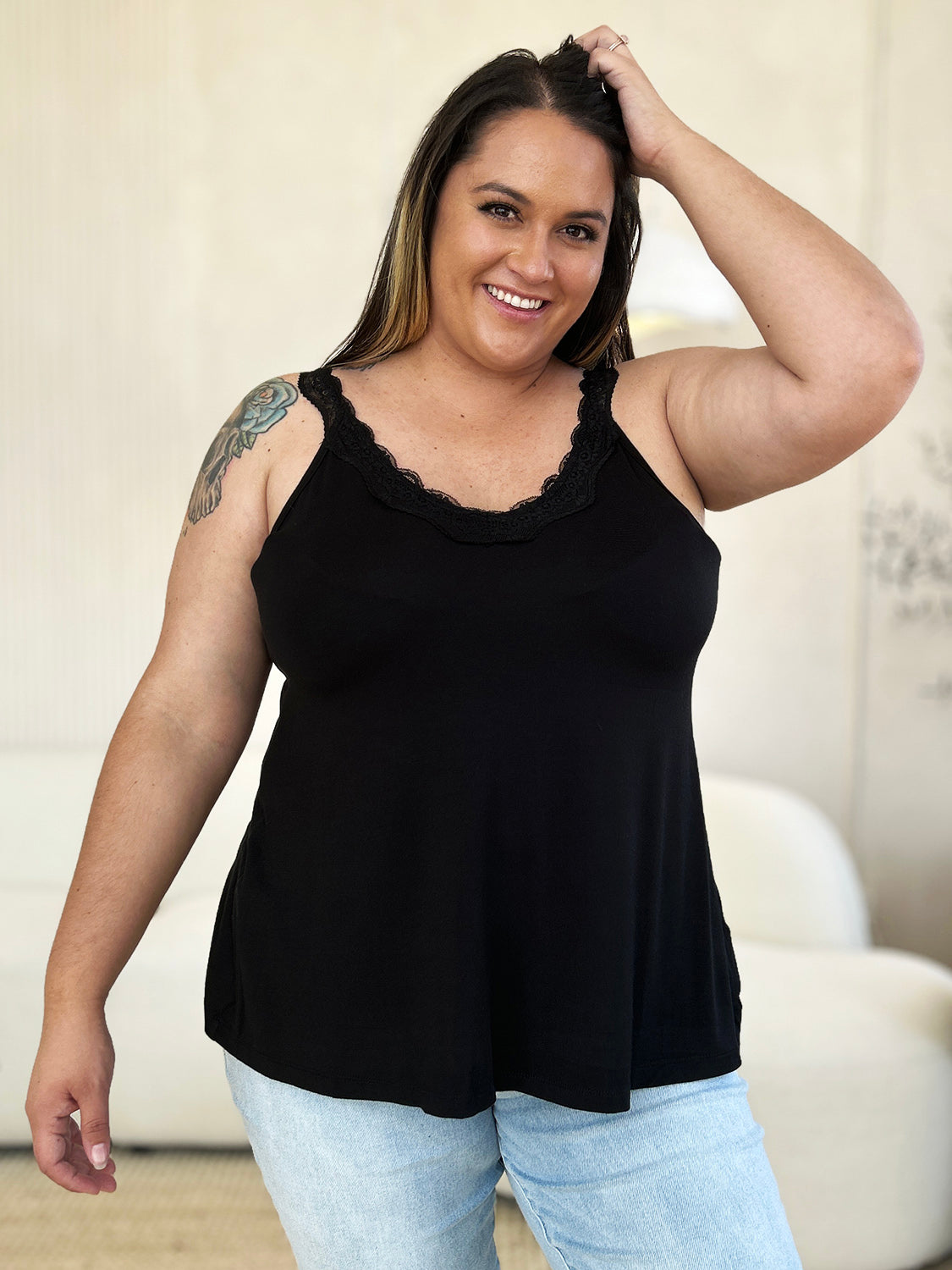 ShopBasicbae Basic Bae lace detail V-neck cutout cami top with thin straps and a fitted silhouette, showcasing delicate lace accents.