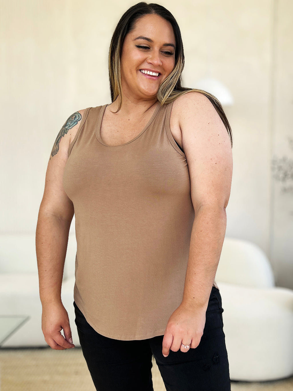 ShopBasicbae Basic Bae round neck curved hem tank top, full size, lightweight sleeveless top with a relaxed fit and curved hem detail.