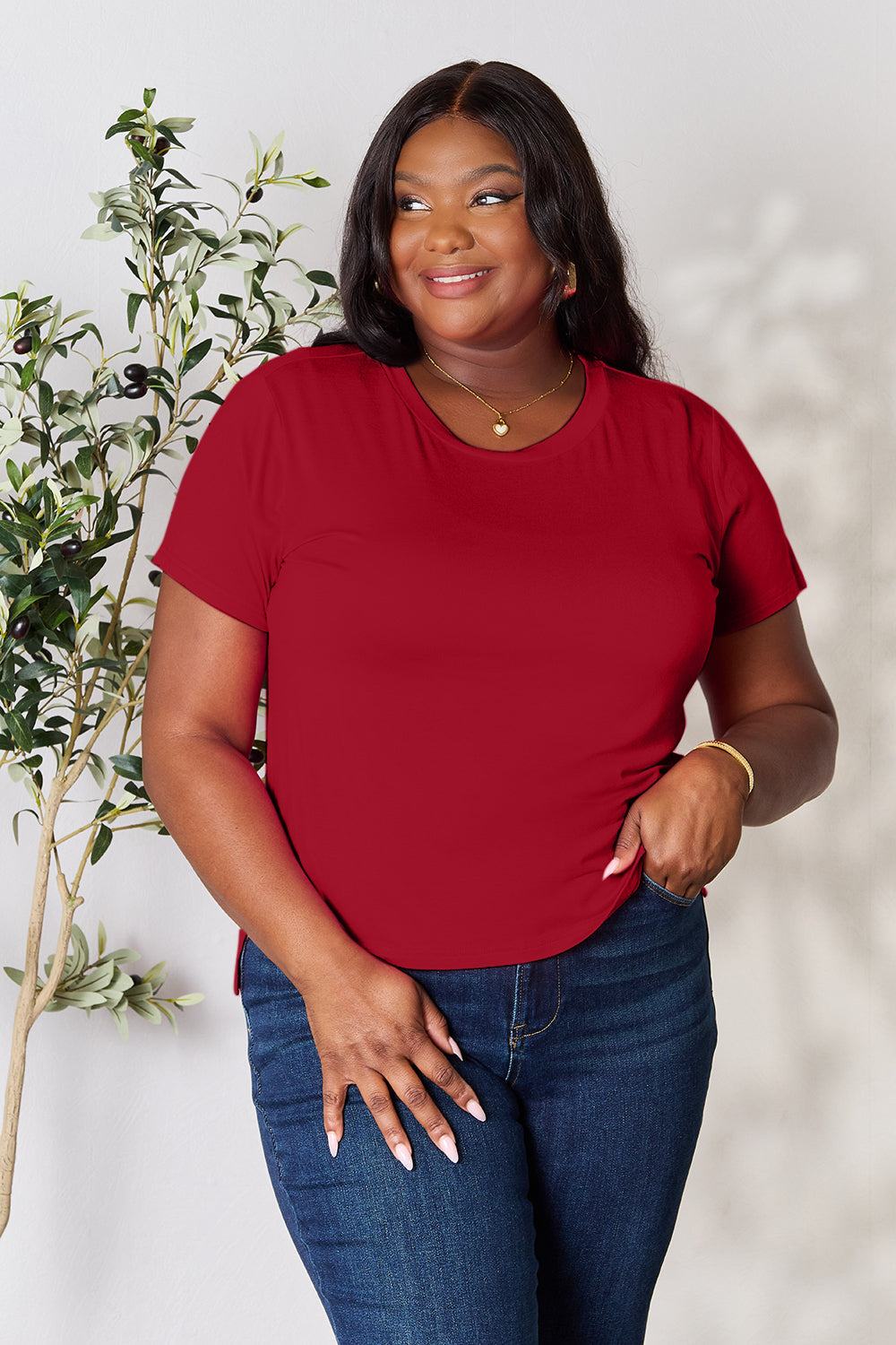 ShopBasicbae Basic Bae full-size round neck short sleeve T-shirt, casual tops in soft fabric, shown on a model.