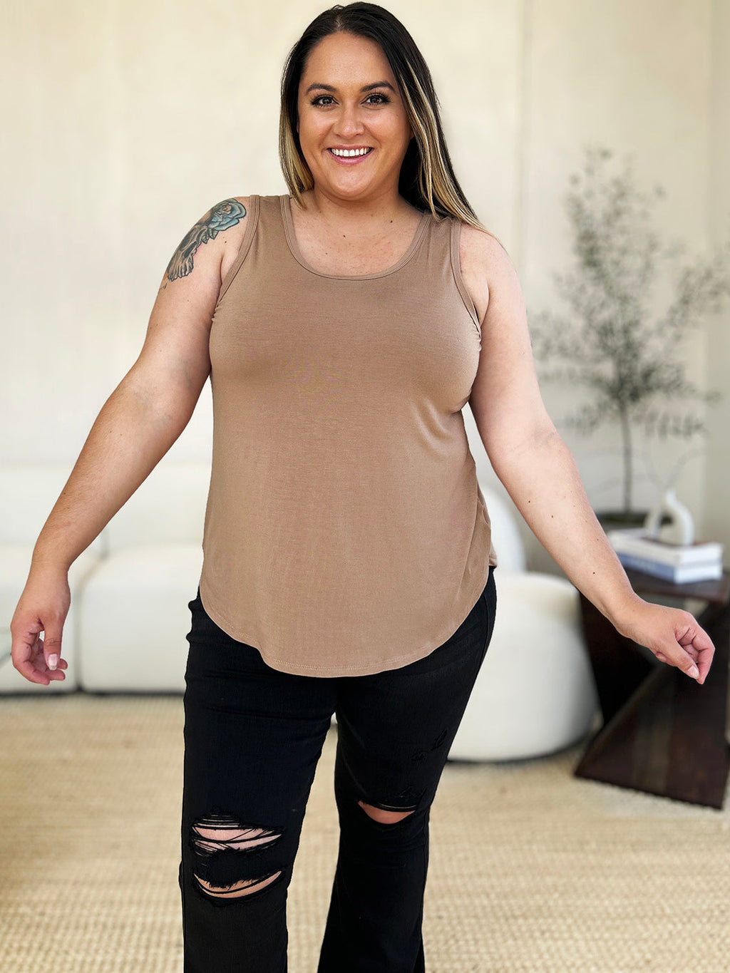 ShopBasicbae Basic Bae full-size round neck tank top with curved hem, shown in a casual, sleeveless design in the image.