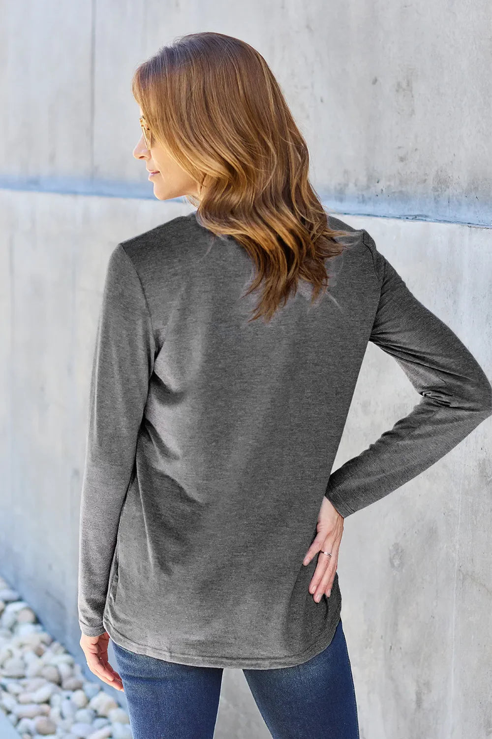 Women's long sleeve round neck top by ShopBasicbae, featuring a classic fit and soft fabric in a neutral color.