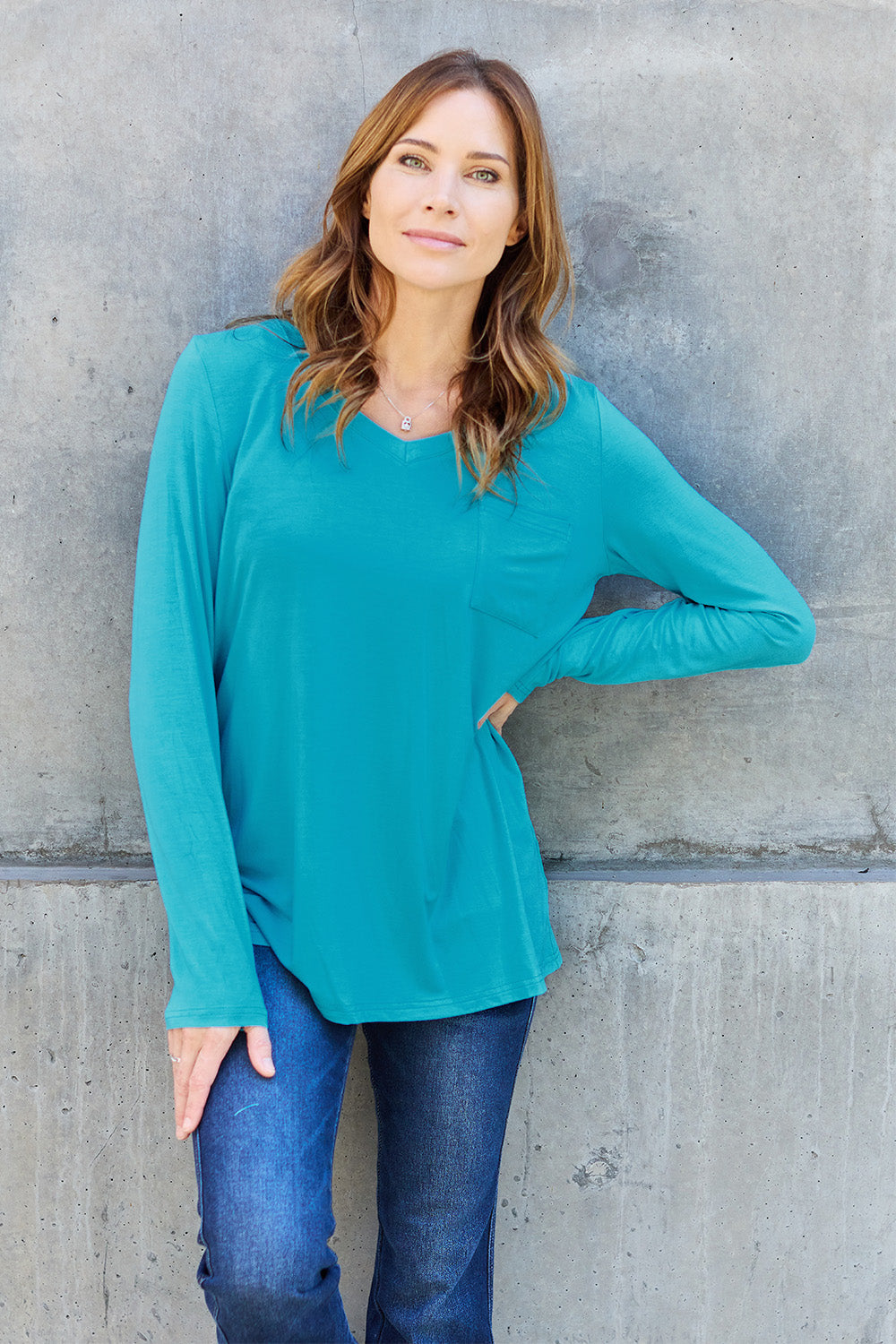Long sleeve V-neck top from ShopBasicbae's Basic Bae collection, shown in a neutral color with a relaxed fit.