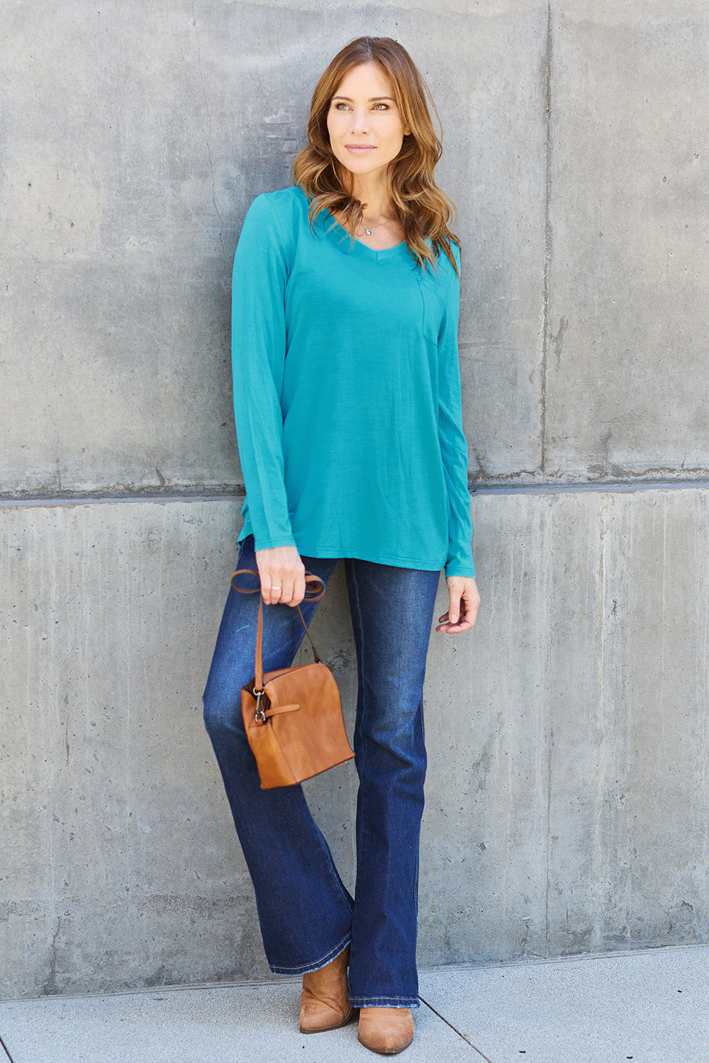 ShopBasicbae Basic Bae full size V-neck long sleeve top, casual women's top with a V-neck and long sleeves, in a neutral color.