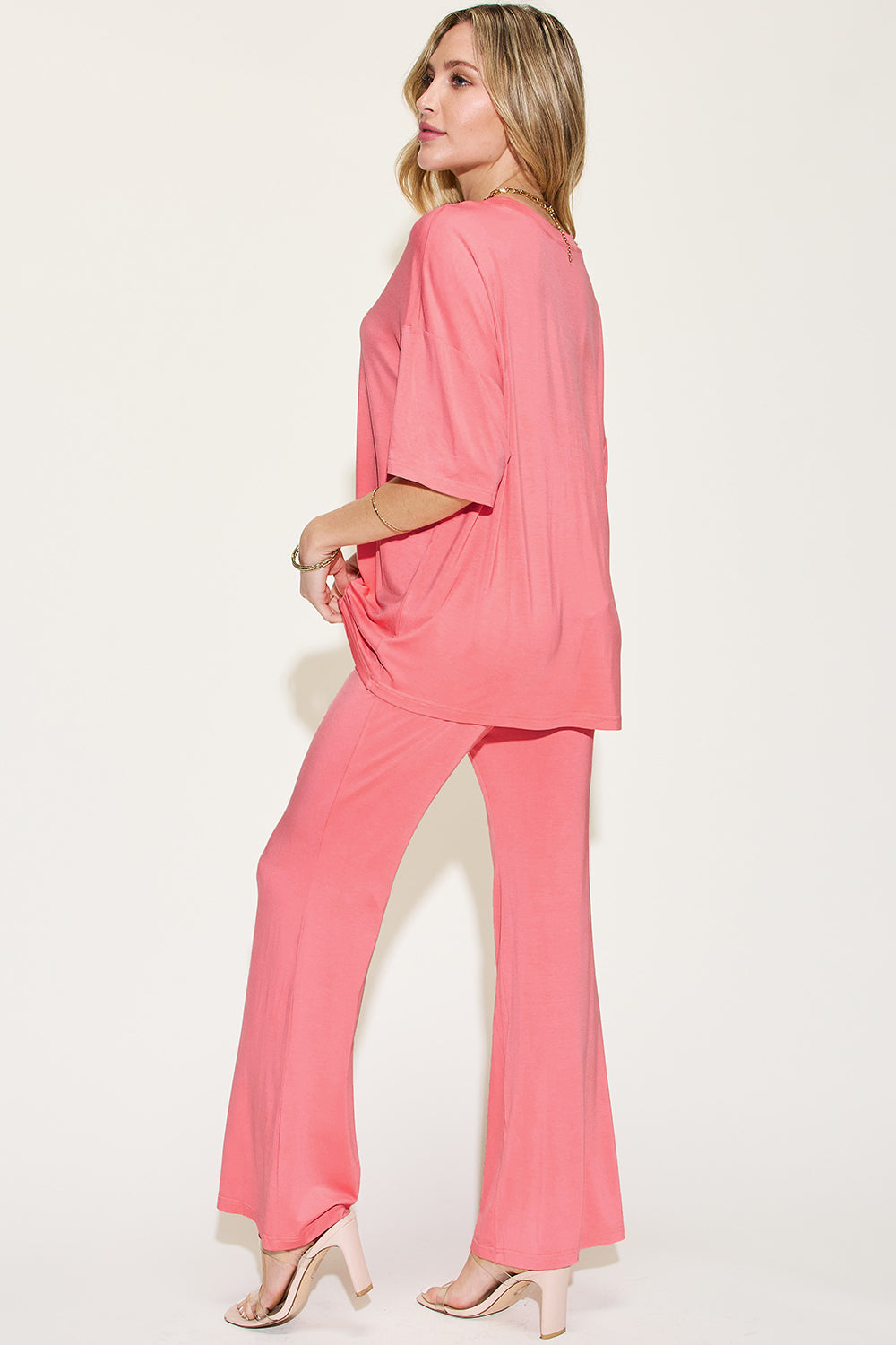 ShopBasicbae bamboo drop shoulder t-shirt and flare pants set, featuring a relaxed fit and natural fabric in neutral tones.