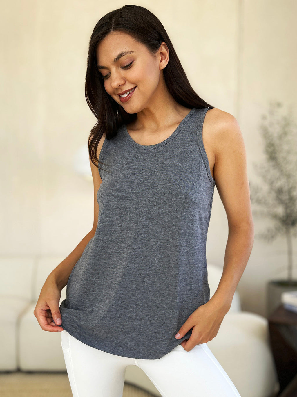 Basic Bae full size round neck curved hem tank top from ShopBasicbae, featuring a classic fit and stylish design.